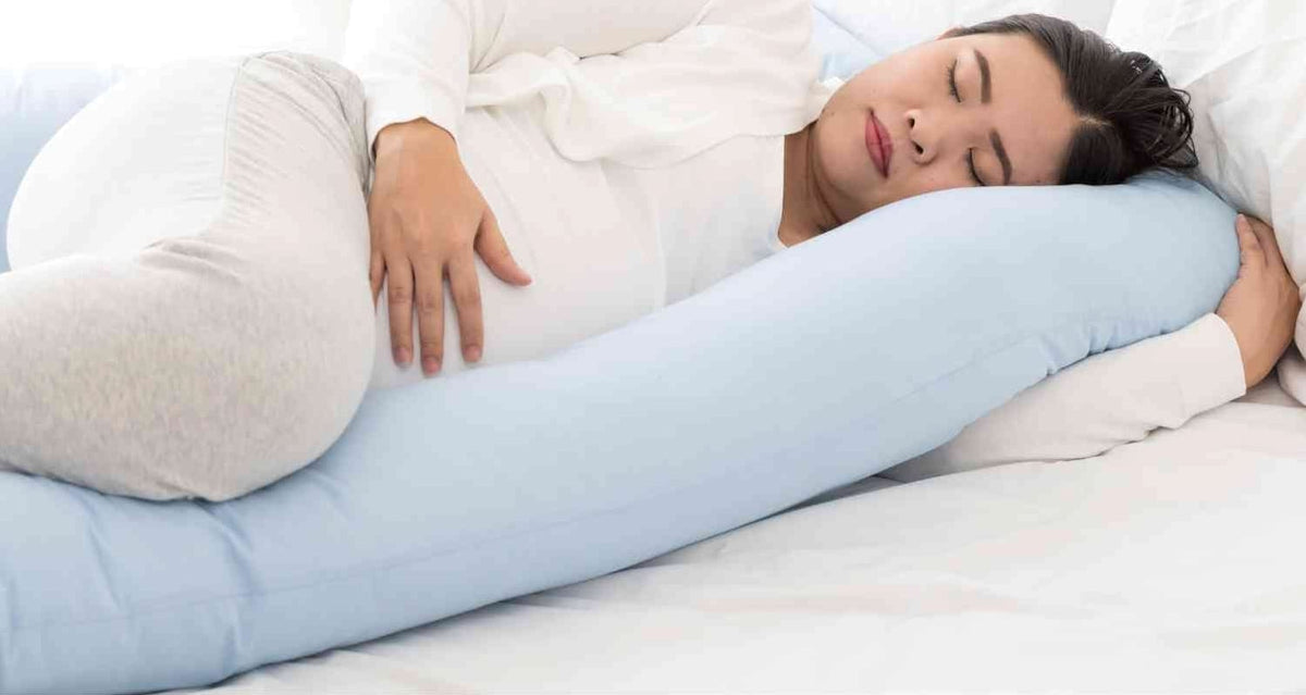 Comment dormir enceinte : la bonne position trimestre par trimestre