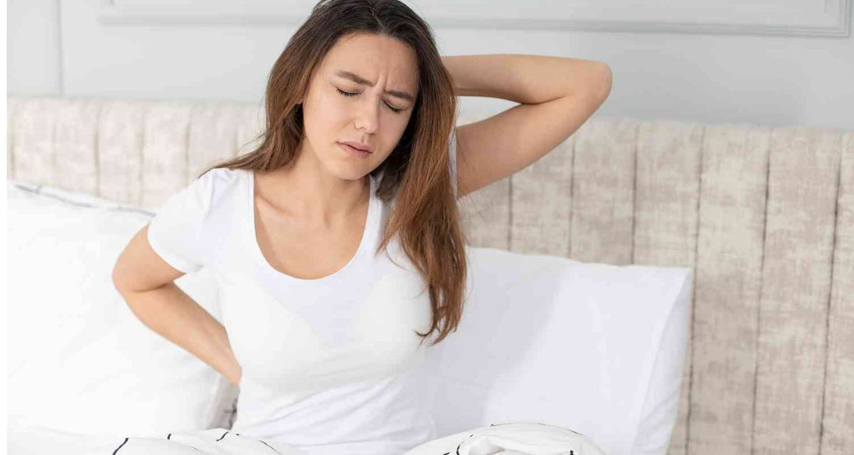 Comment soulager un mal de dos au réveil : Solutions efficaces